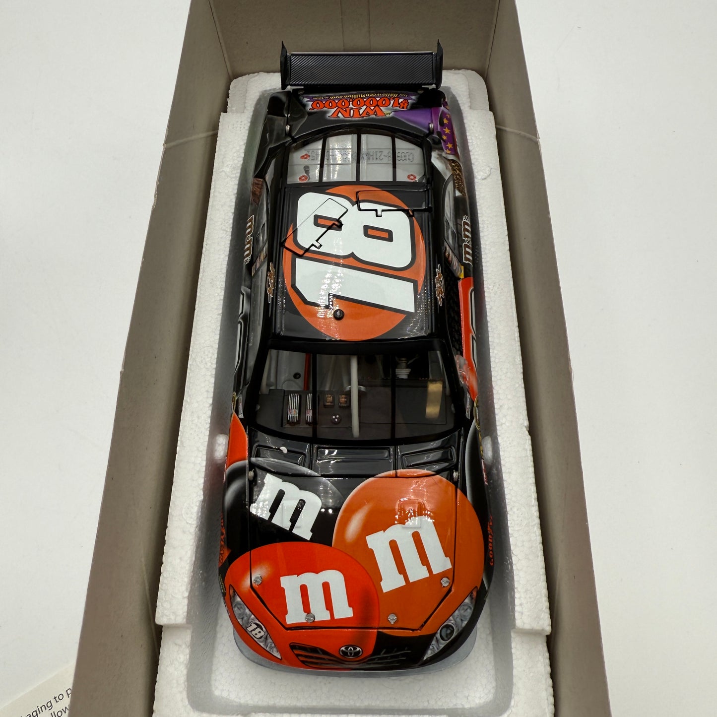 2009 Kyle Busch #18 M&M's Halloween Diecast Car - Action Racing 1:24 Model