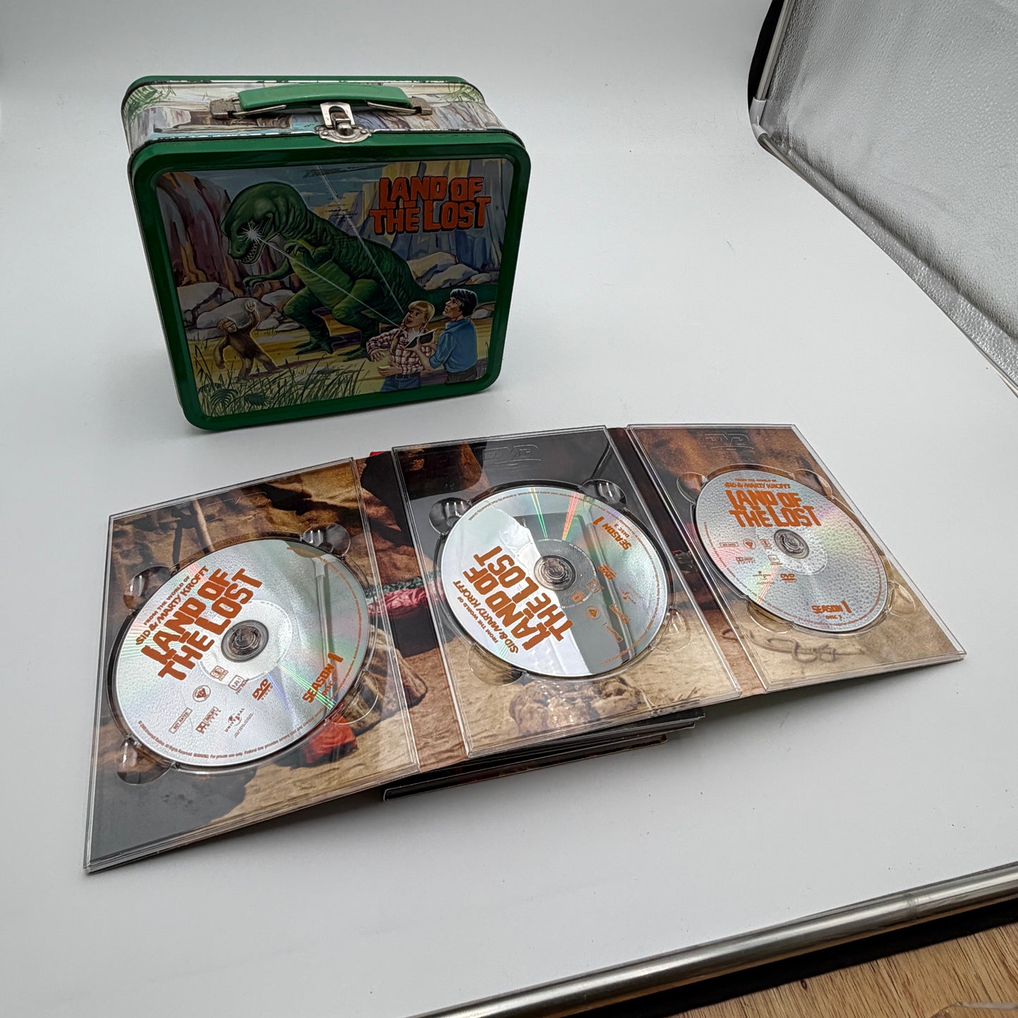 Sid and Marty Krofft Land of the Lost Lunchbox with Seasons 1-3 DVDs - Green - Collectible