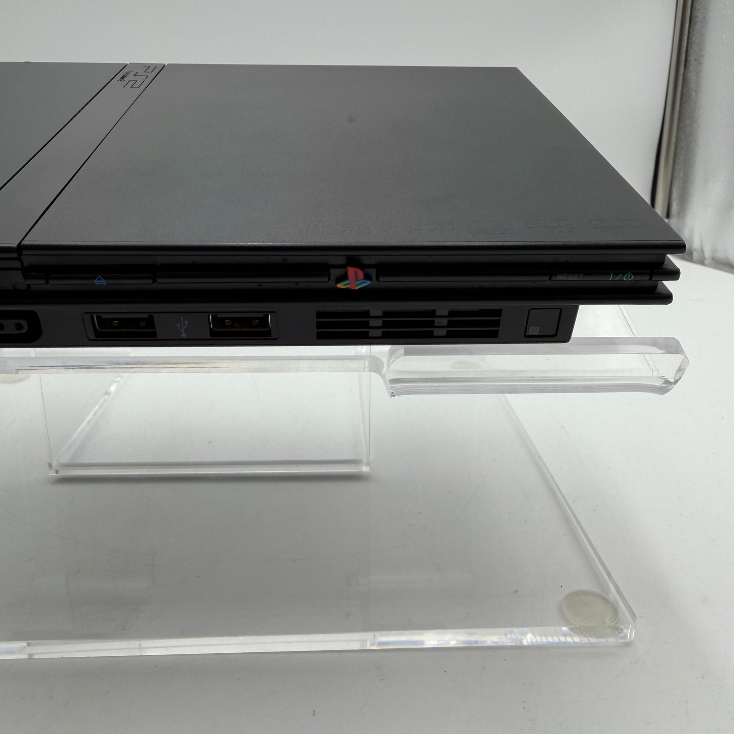 Sony PlayStation 2 Slim (SCPH-75001) Two controllers