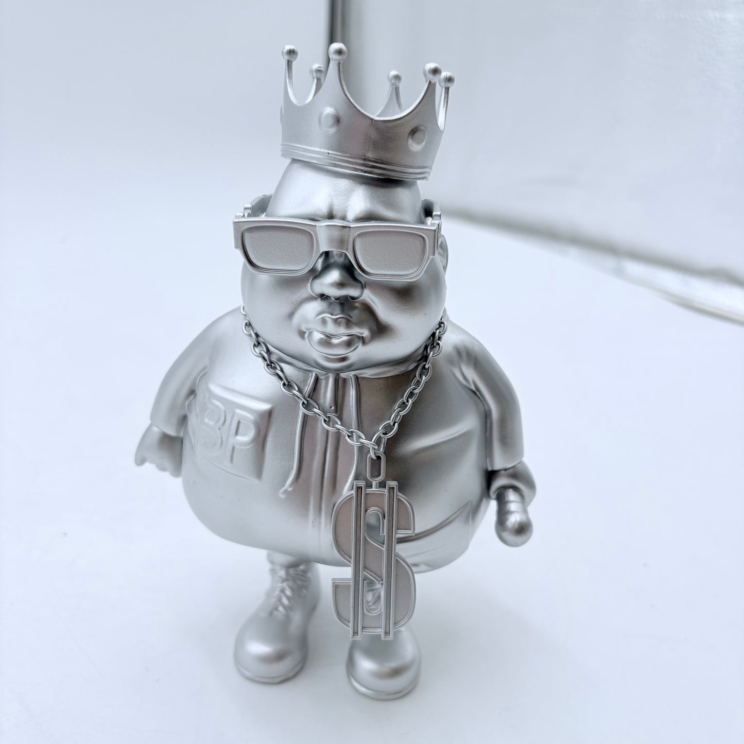 Clutter Studios Big Poppa Hustle Silver Ltd 100 Vinyl Figure by Ron English