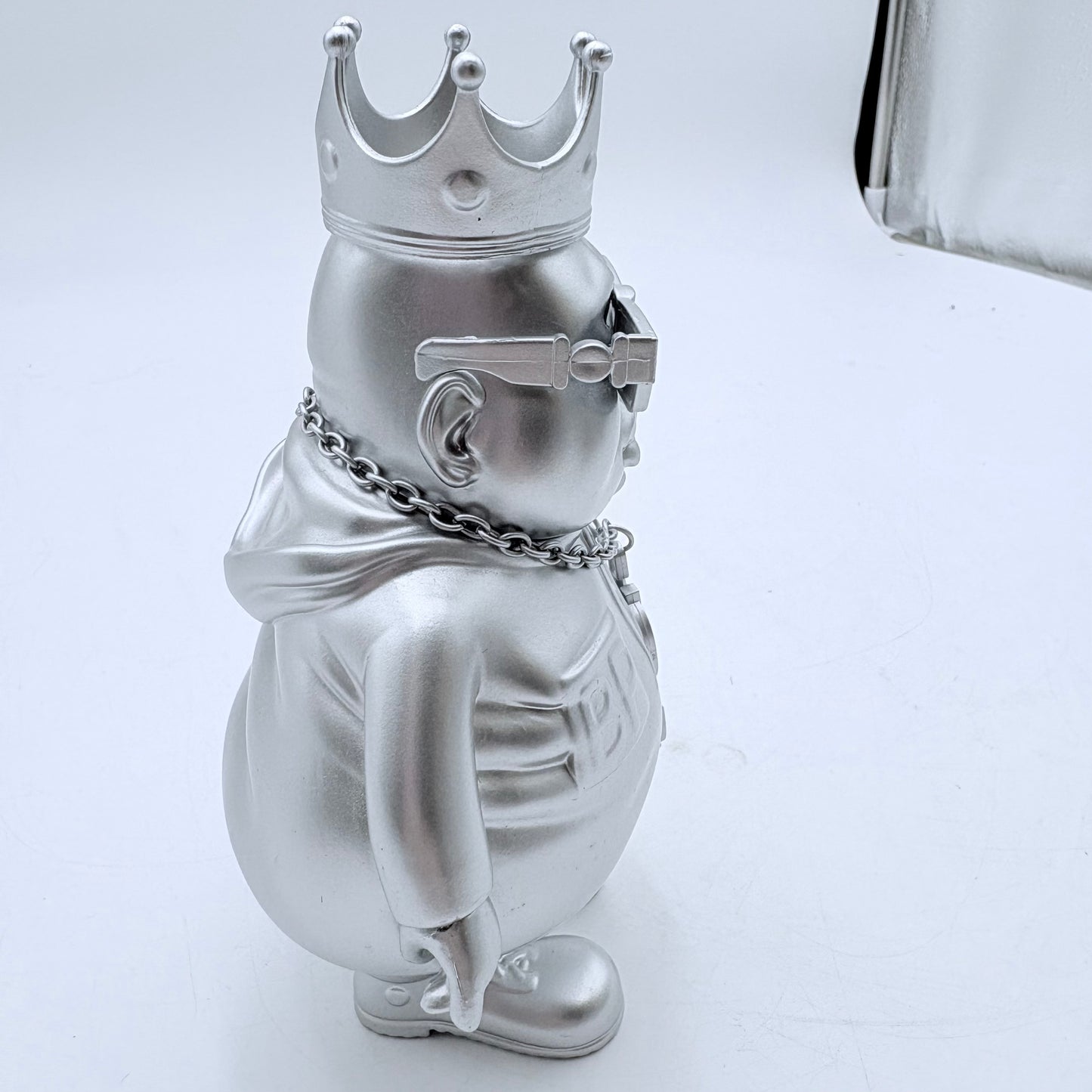 Clutter Studios Big Poppa Hustle Silver Ltd 100 Vinyl Figure by Ron English