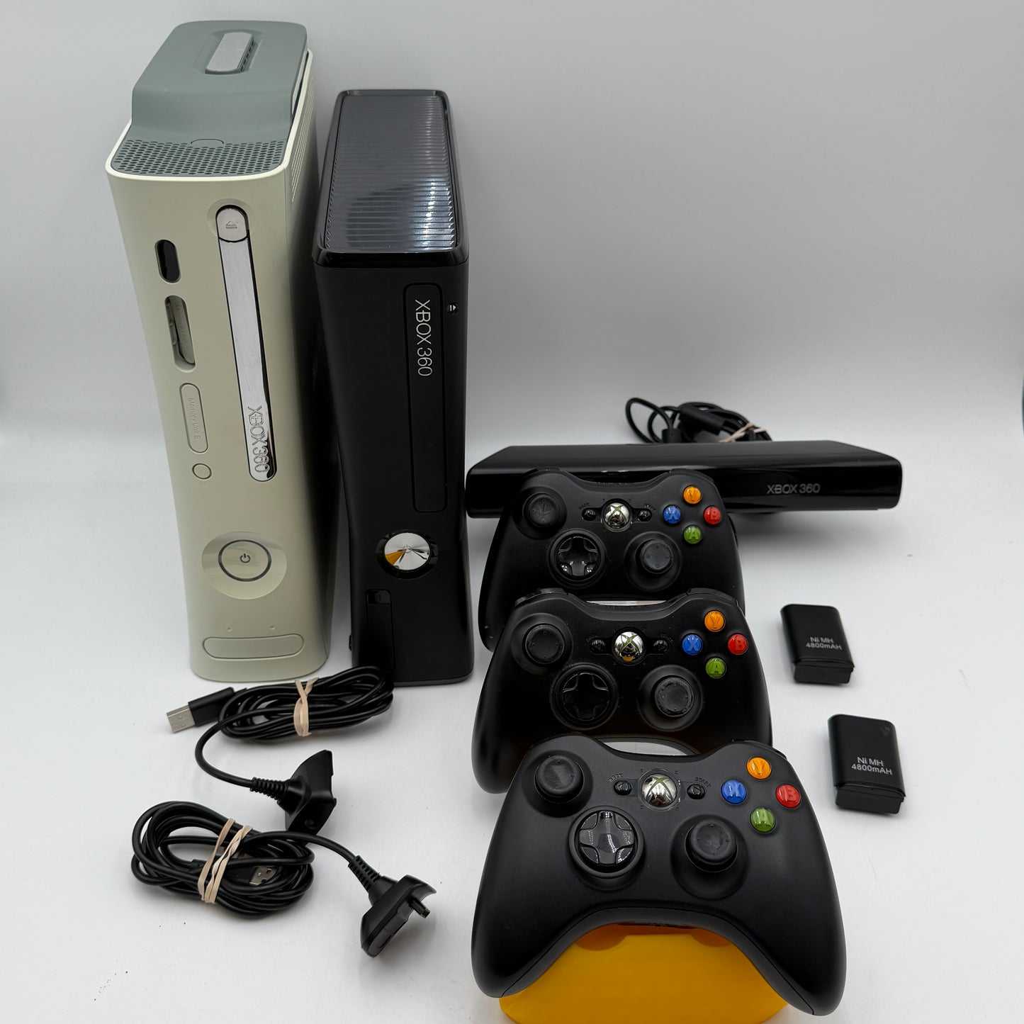 Microsoft Xbox 360 Lot of Two With 3 Controllers and Rechargeable Batteries