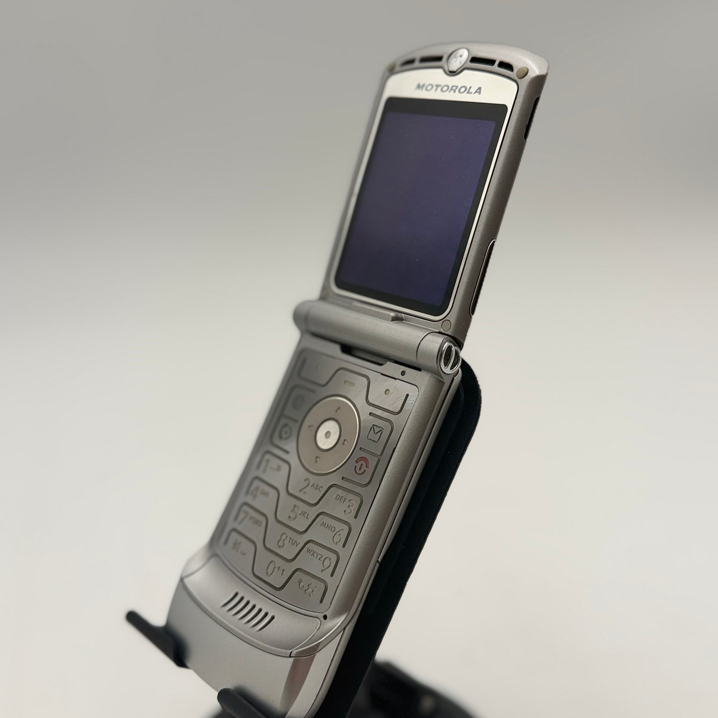 Motorola Razr V3 Silver Flip Phone with Bluetooth Earpiece & Accessories