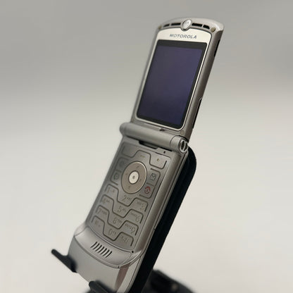 Motorola Razr V3 Silver Flip Phone with Bluetooth Earpiece & Accessories