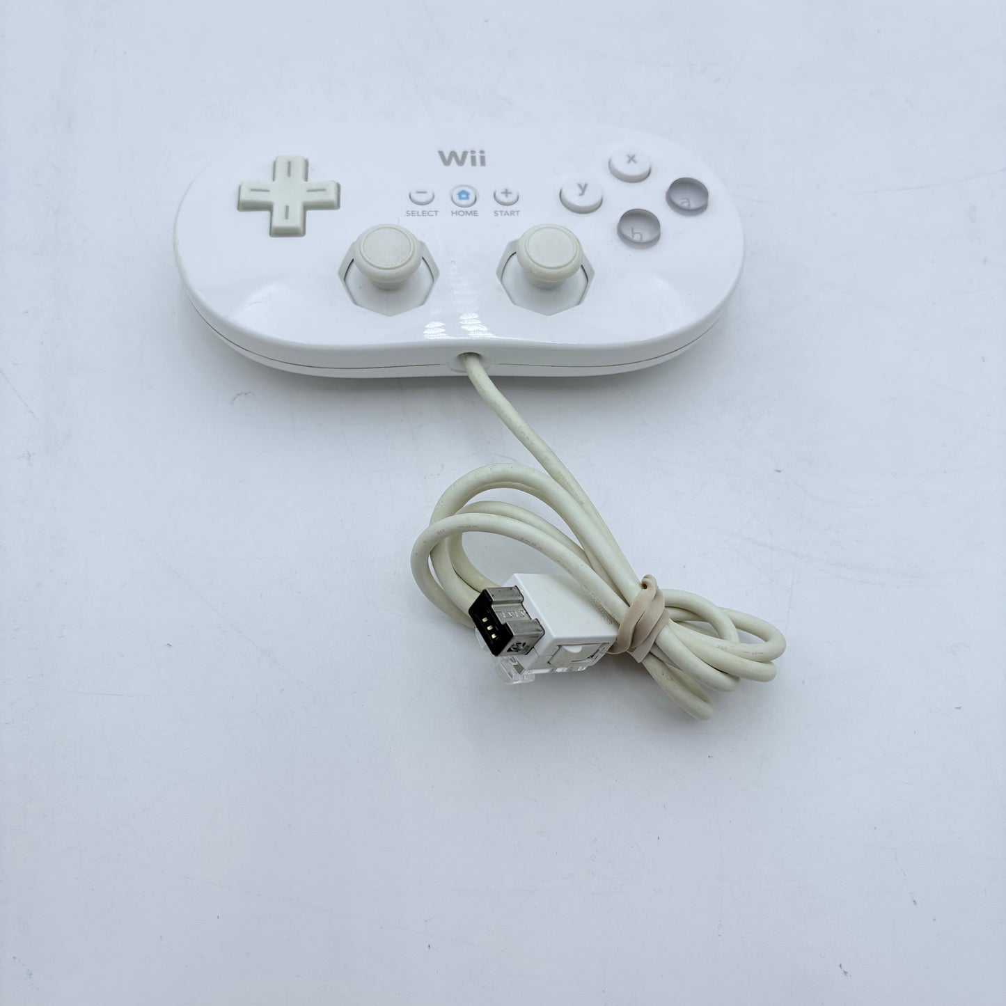 Nintendo Wii Controller Lot with Gun, Wheel, Two Gamepads, Three Controllers, Drawing Pad