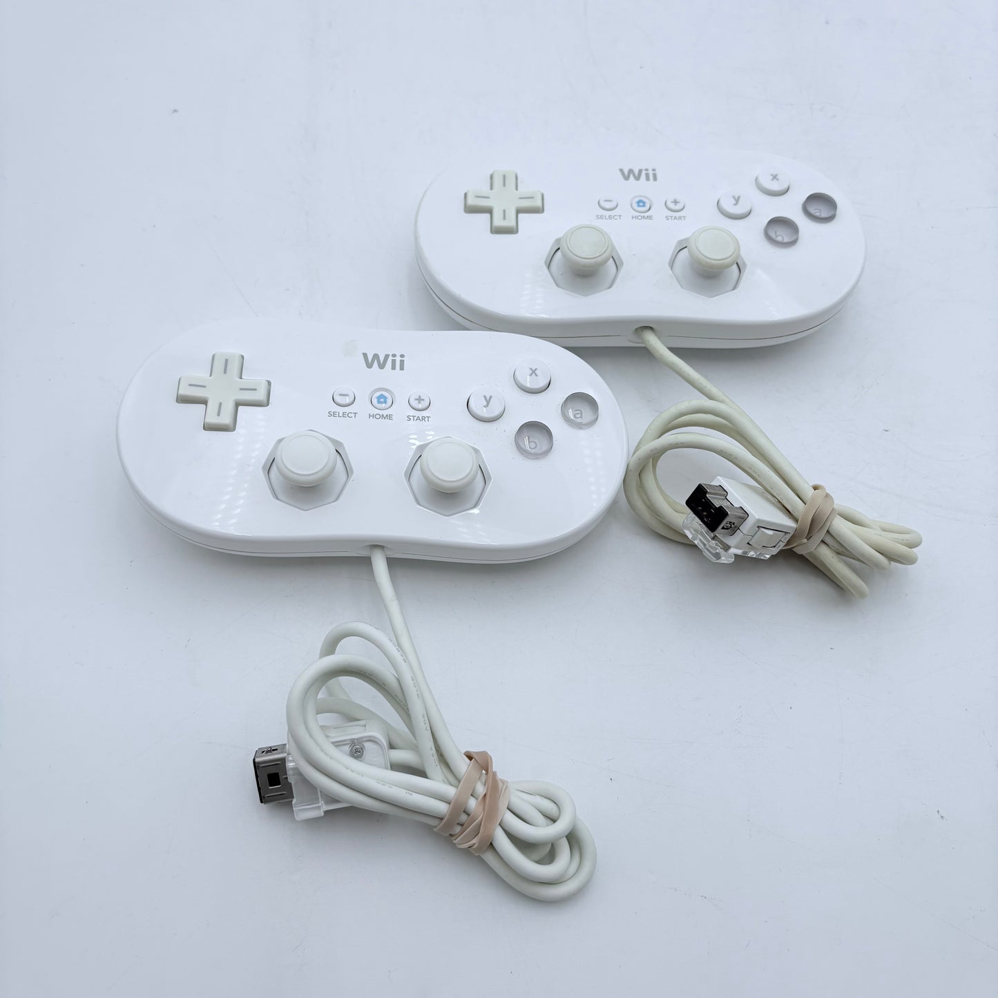 Nintendo Wii Controller Lot with Gun, Wheel, Two Gamepads, Three Controllers, Drawing Pad
