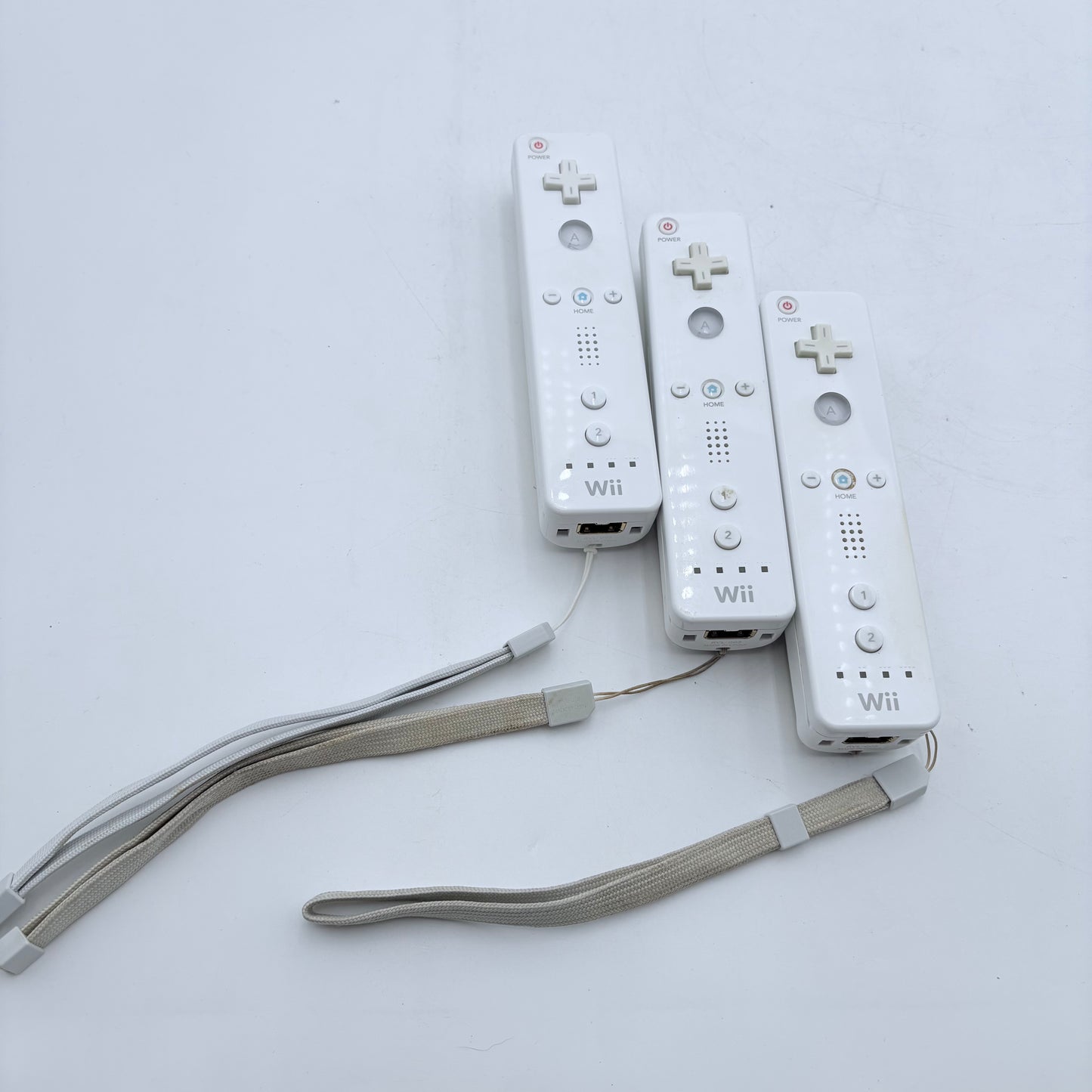 Nintendo Wii Controller Lot with Gun, Wheel, Two Gamepads, Three Controllers, Drawing Pad
