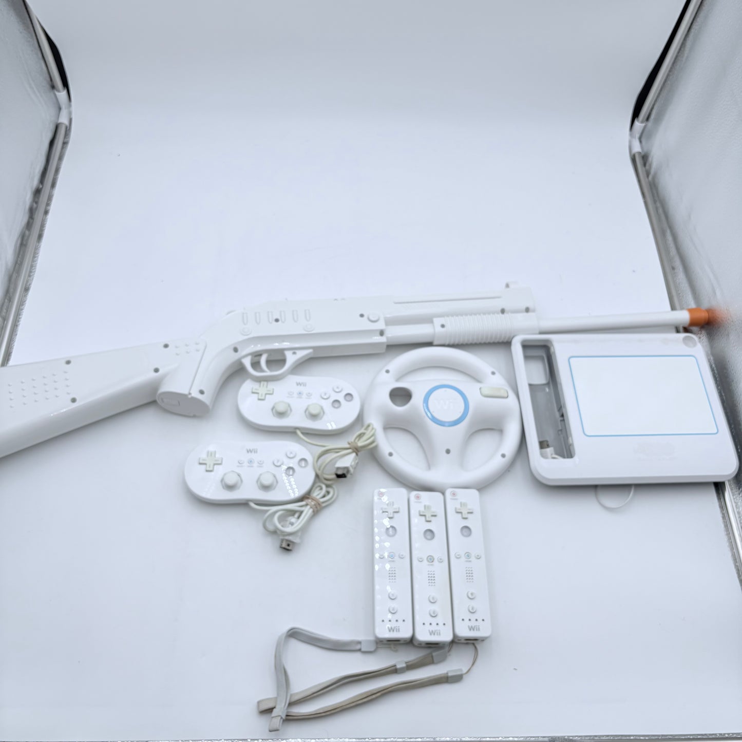 Nintendo Wii Controller Lot with Gun, Wheel, Two Gamepads, Three Controllers, Drawing Pad