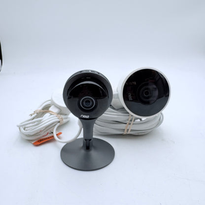 Lot of two of Google Nest Cameras, one indoor and the other outdoor. READ