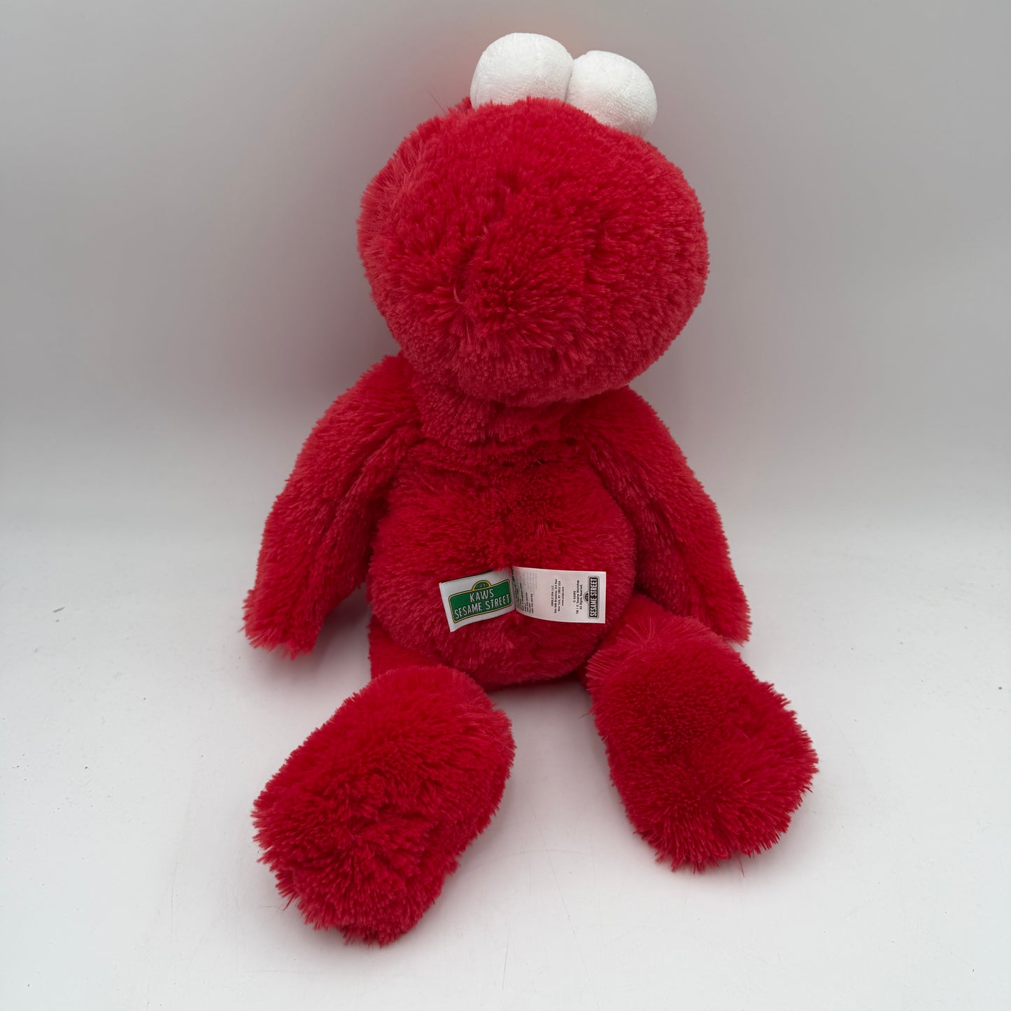 KAWS x Uniqlo Sesame Street Elmo 21" Red Plush Stuffed Toy