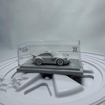 Mattel Creations Hot Wheels x Daniel Arsham Eroded Porsche 930 & Rally Case