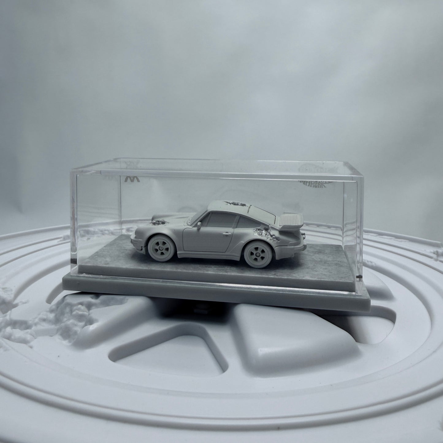 Mattel Creations Hot Wheels x Daniel Arsham Eroded Porsche 930 & Rally Case