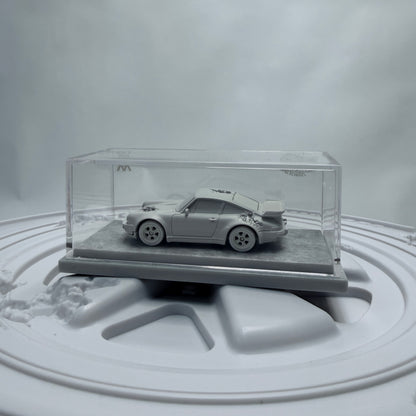 Mattel Creations Hot Wheels x Daniel Arsham Eroded Porsche 930 & Rally Case